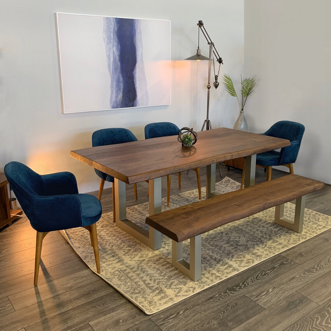 staged dining room with blue chairs